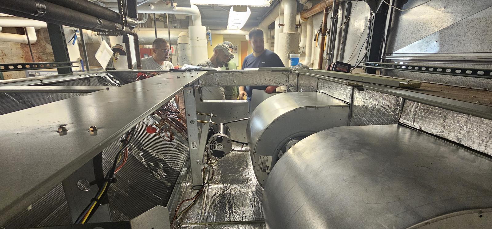 Insulated supply ductwork and transitions installed above a mechanical room